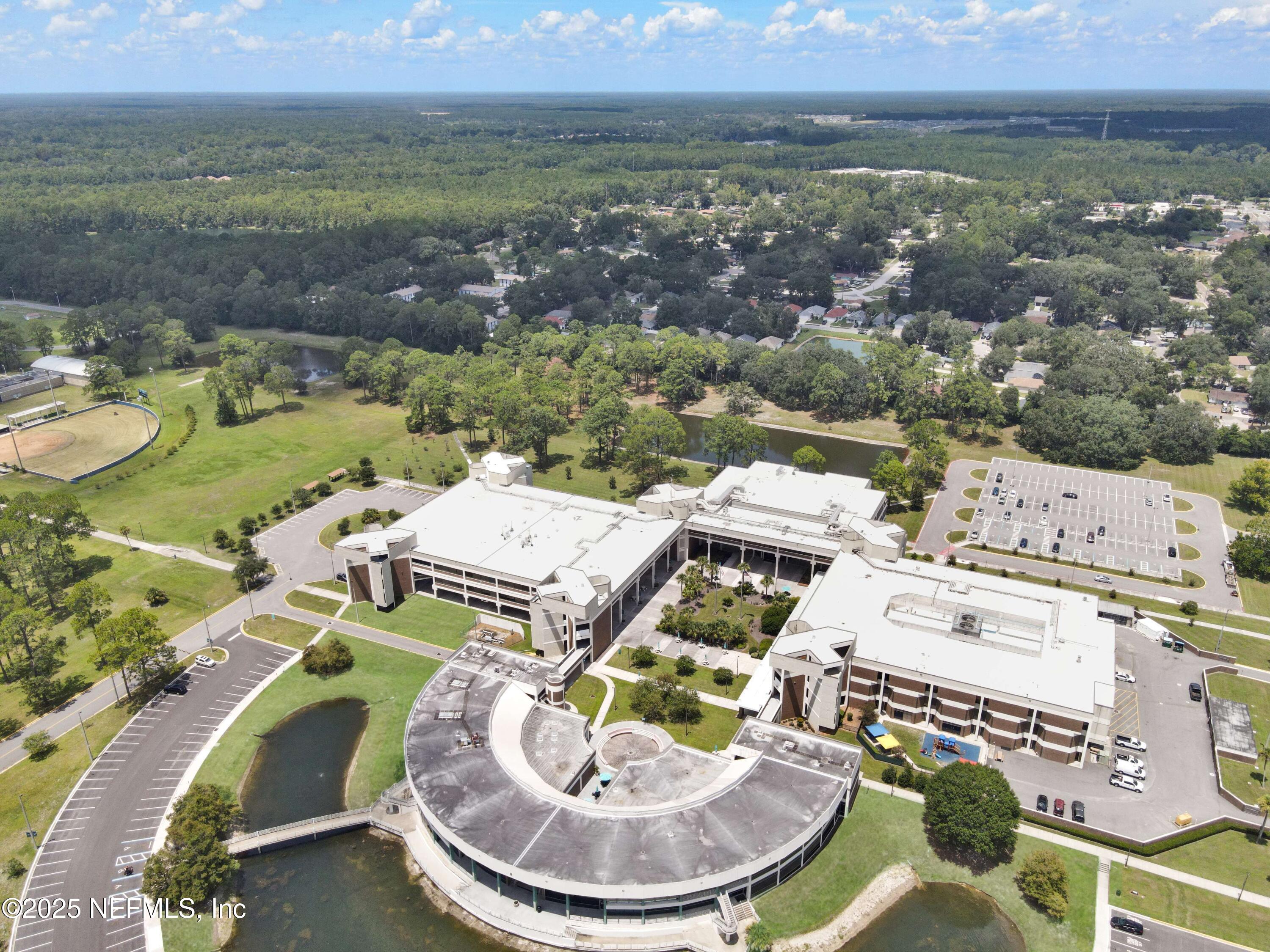 10825 Key Haven Boulevard, Unit 508 Jacksonville, FL 32218 - Photo 14 of 18 an aerial view of a house with outdoor space