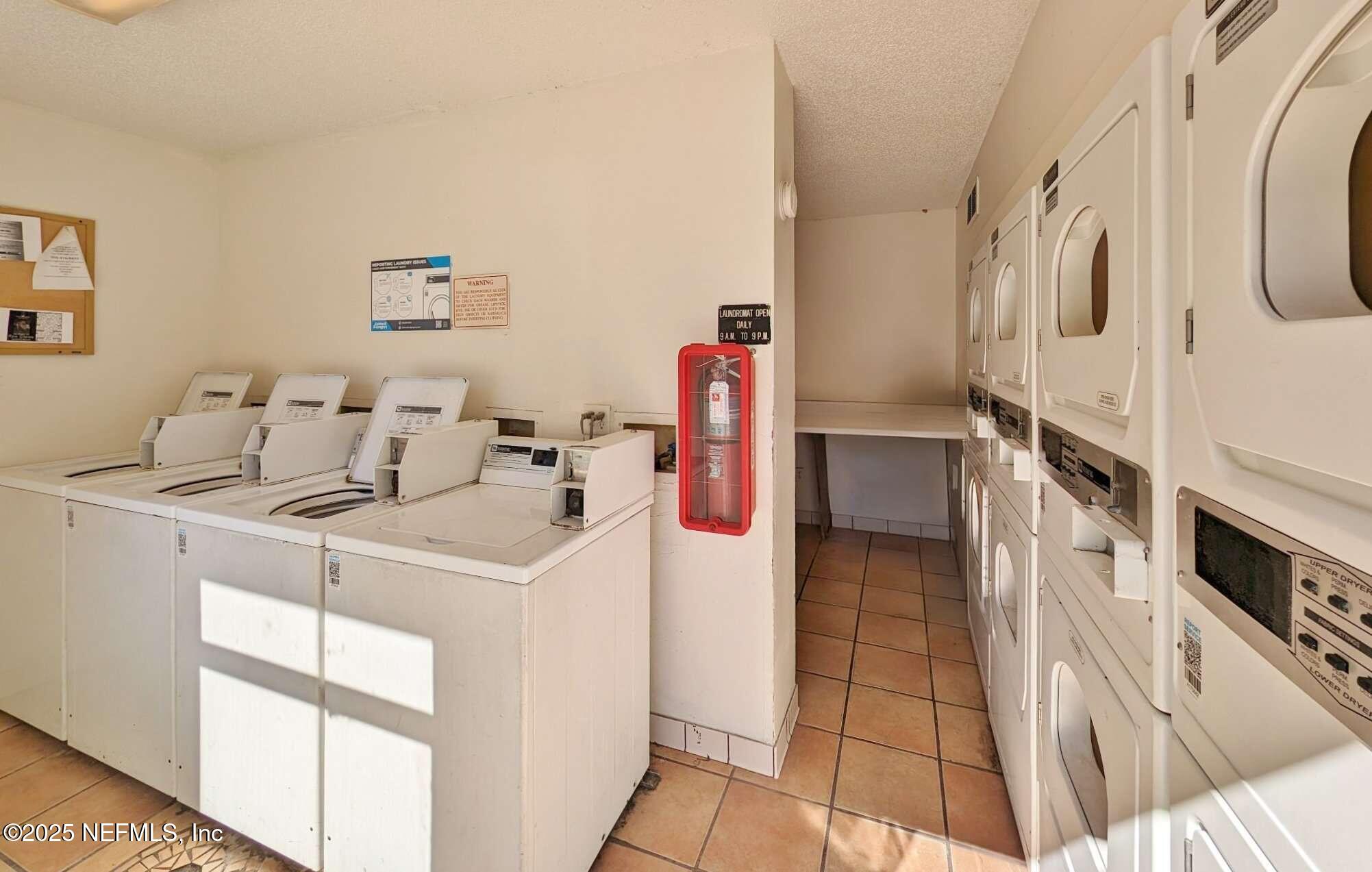10825 Key Haven Boulevard, Unit 508 Jacksonville, FL 32218 - Photo 16 of 18 a utility room with dryer and washer
