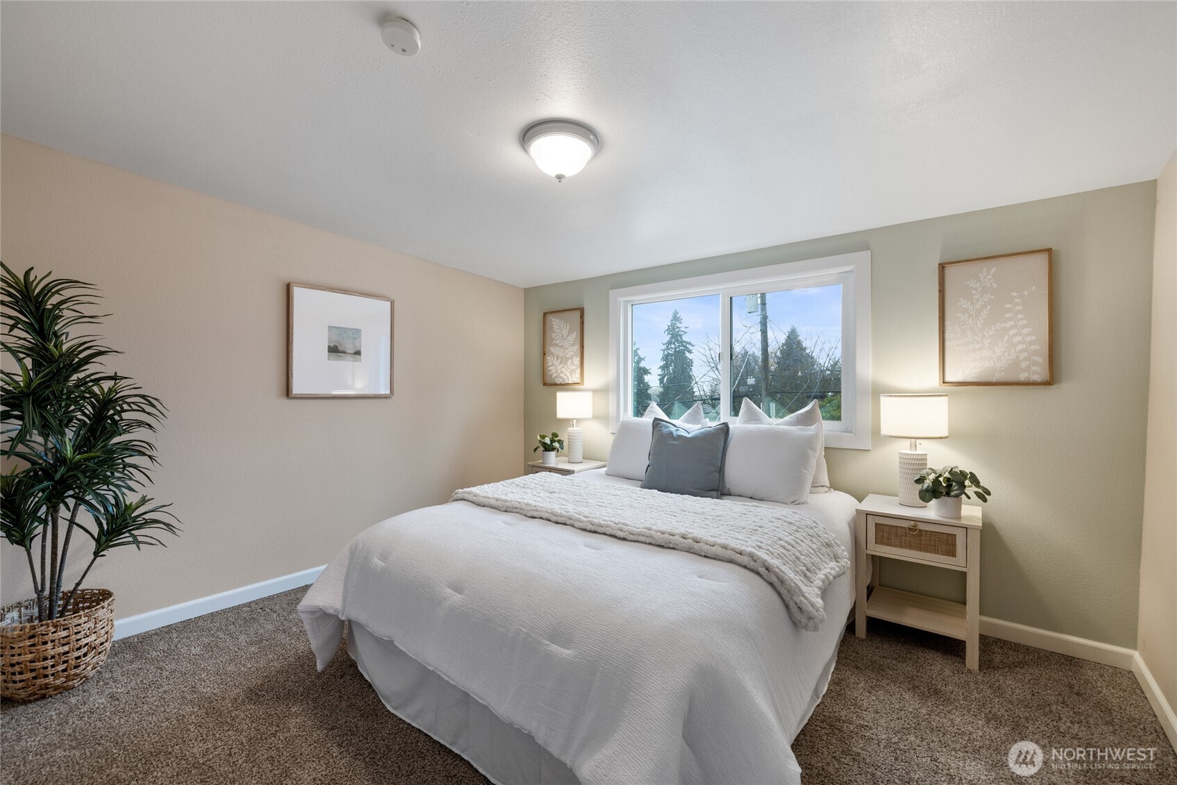 4011 East I Street Tacoma, WA 98404 - Photo 18 of 33 a bedroom with a large bed and a window