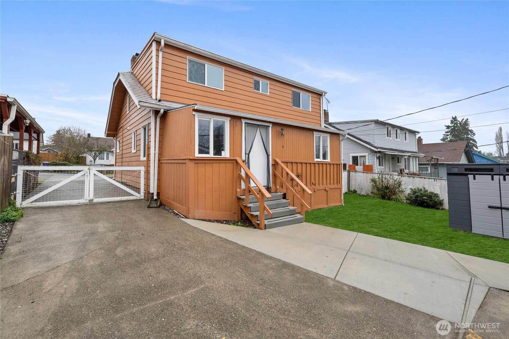 4011 East I Street Tacoma, WA 98404 - Photo 28 of 33 a view of a house with a yard