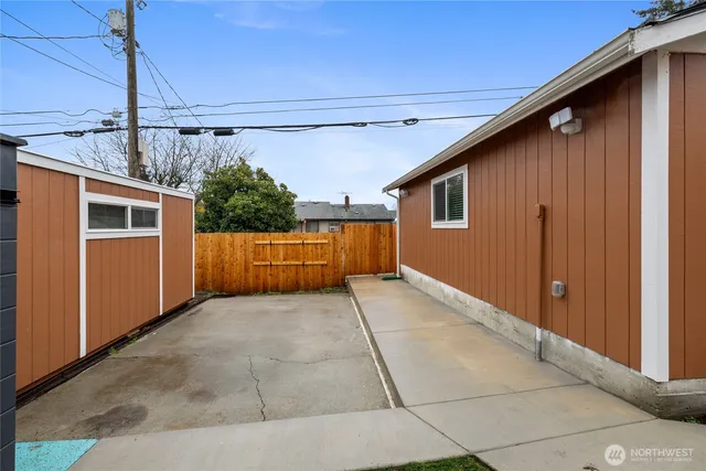a house view with a backyard space
