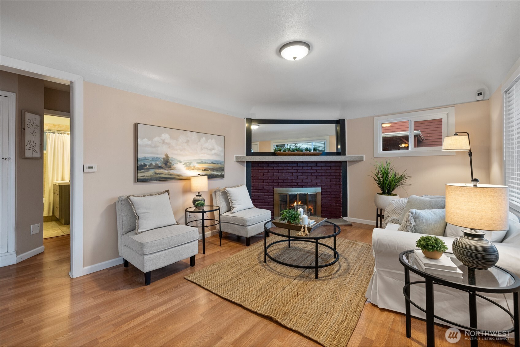 4011 East I Street Tacoma, WA 98404 - Photo 3 of 33 a living room with furniture and a fireplace