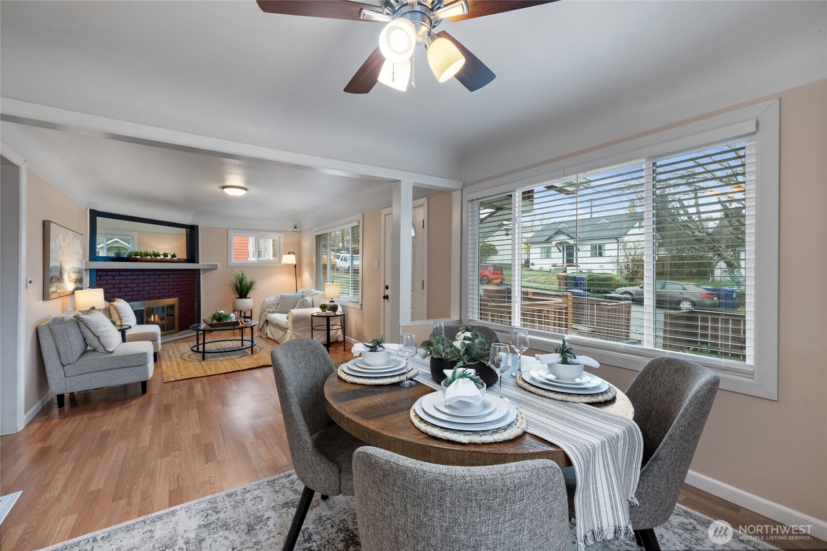 4011 East I Street Tacoma, WA 98404 - Photo 6 of 33 a view of a dining room with furniture window and wooden floor