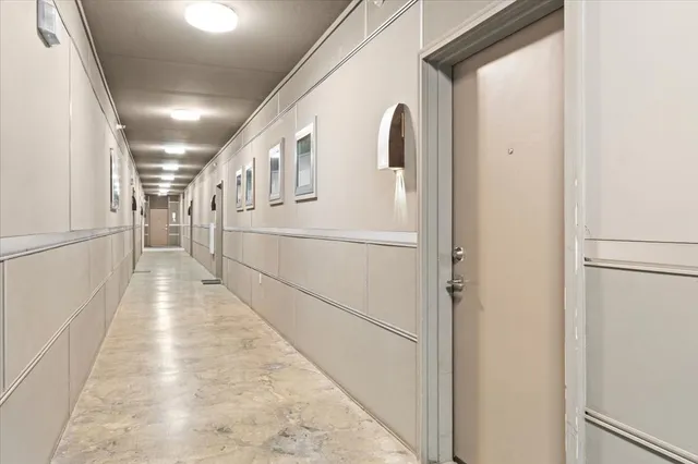 a kitchen with a sink stove and microwave