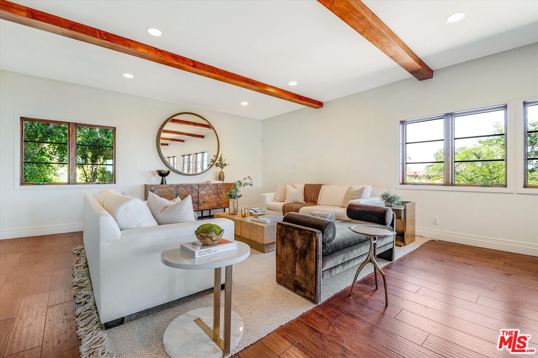 1405 Mayapan Road La Habra Heights, CA 90631 - Photo 11 of 54 a living room with furniture a window and wooden floor