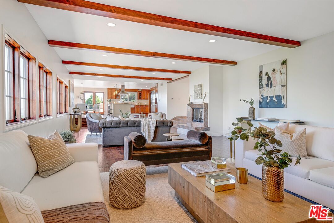 1405 Mayapan Road La Habra Heights, CA 90631 - Photo 12 of 54 a living room with furniture and a potted plant