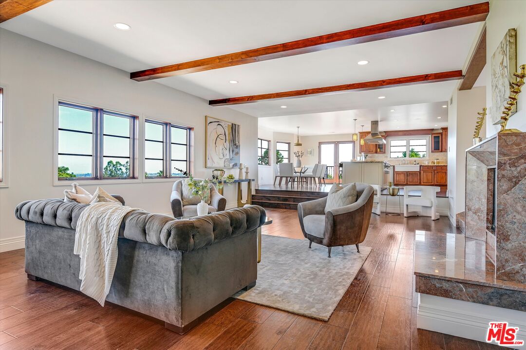 1405 Mayapan Road La Habra Heights, CA 90631 - Photo 13 of 54 a living room with furniture and a large window