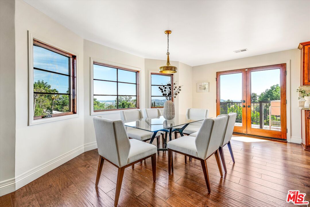 1405 Mayapan Road La Habra Heights, CA 90631 - Photo 18 of 54 a dining room with furniture window wooden floor