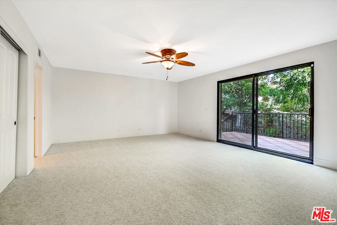 1405 Mayapan Road La Habra Heights, CA 90631 - Photo 21 of 54 a view of a room with a ceiling fan and window