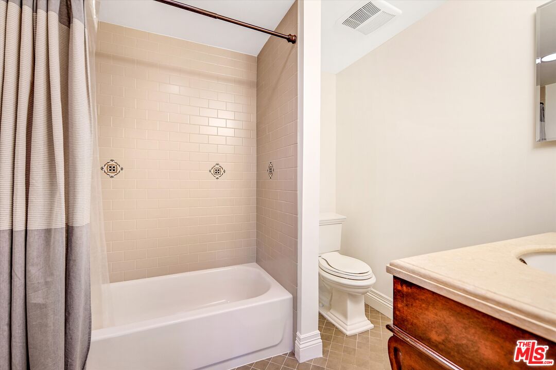 1405 Mayapan Road La Habra Heights, CA 90631 - Photo 22 of 54 a bathroom with a bathtub and a toilet