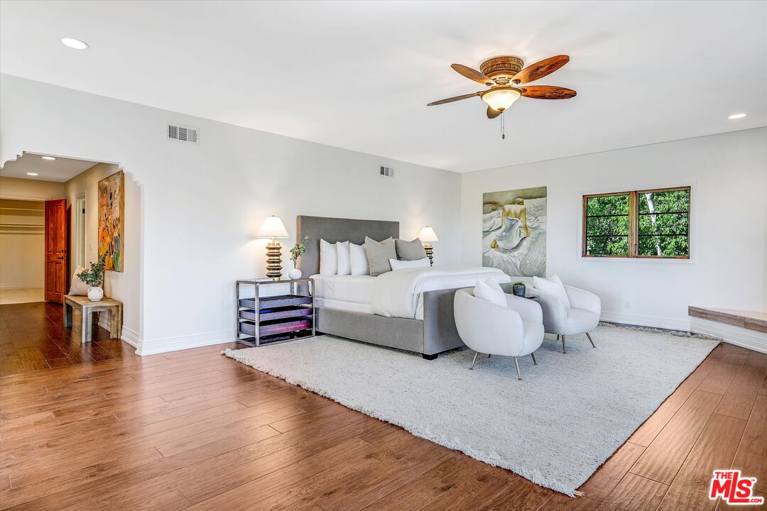 1405 Mayapan Road La Habra Heights, CA 90631 - Photo 24 of 54 a bedroom with a bed and a large window