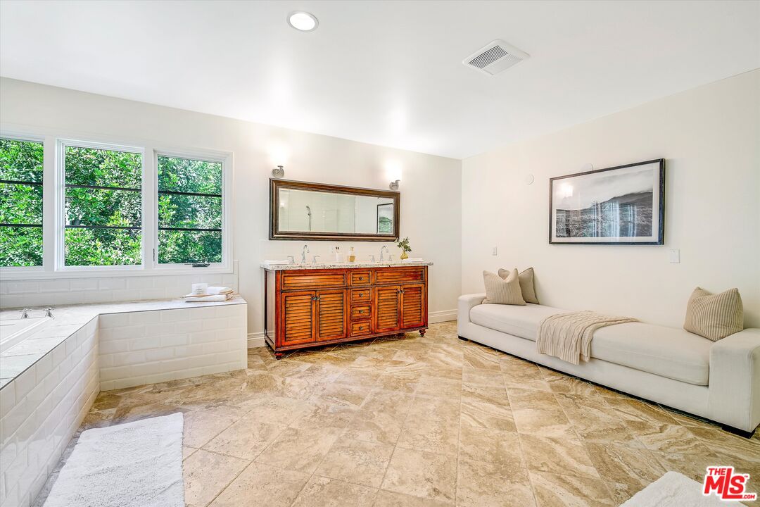 1405 Mayapan Road La Habra Heights, CA 90631 - Photo 27 of 54 a living room with furniture and a flat screen tv