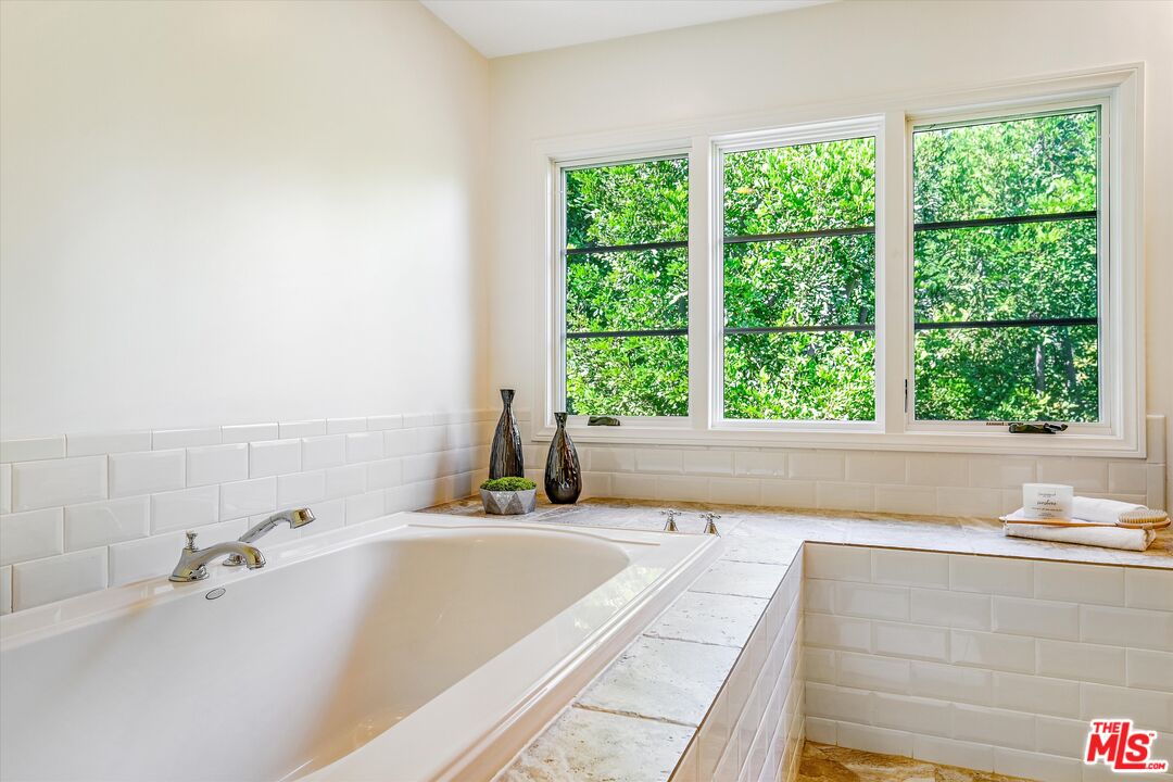 1405 Mayapan Road La Habra Heights, CA 90631 - Photo 28 of 54 a bath tub sitting in a bathroom next to a window