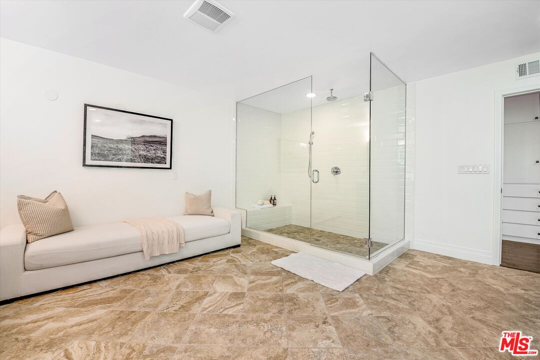1405 Mayapan Road La Habra Heights, CA 90631 - Photo 29 of 54 a spacious bedroom with a bed and a shower
