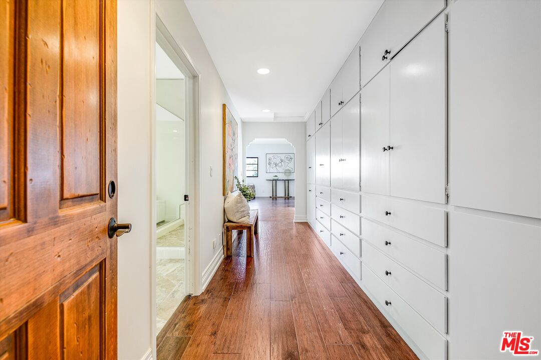 1405 Mayapan Road La Habra Heights, CA 90631 - Photo 31 of 54 a view of a hallway with wooden floor and staircase