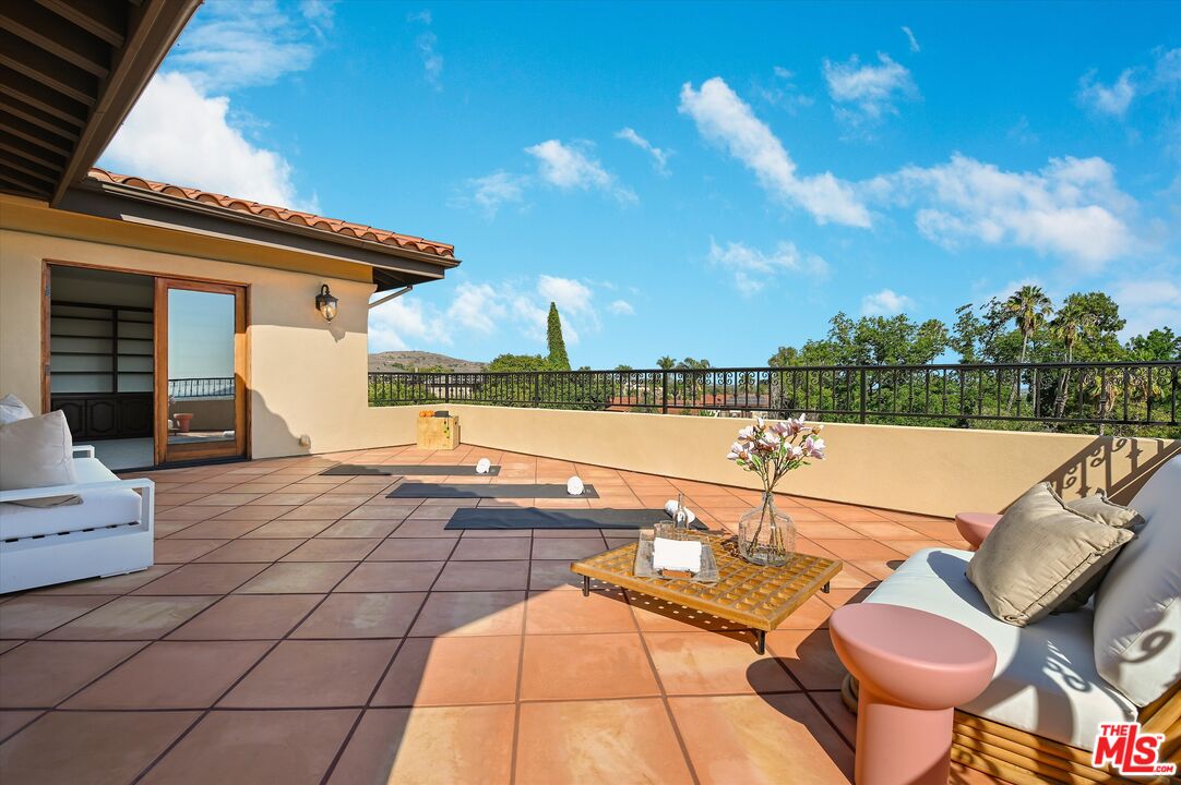 1405 Mayapan Road La Habra Heights, CA 90631 - Photo 33 of 54 a view of a terrace with furniture and a garden