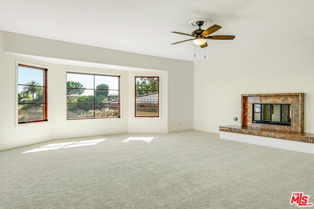 1405 Mayapan Road La Habra Heights, CA 90631 - Photo 36 of 54 an empty room with fan and windows