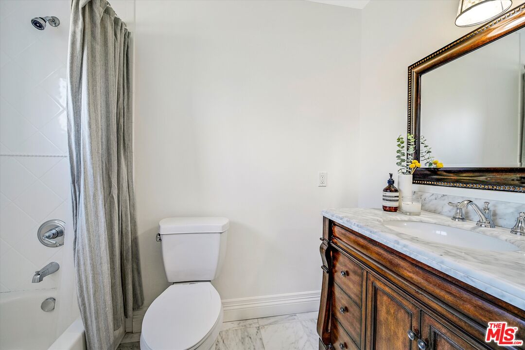1405 Mayapan Road La Habra Heights, CA 90631 - Photo 41 of 54 a bathroom with a sink a toilet and shower