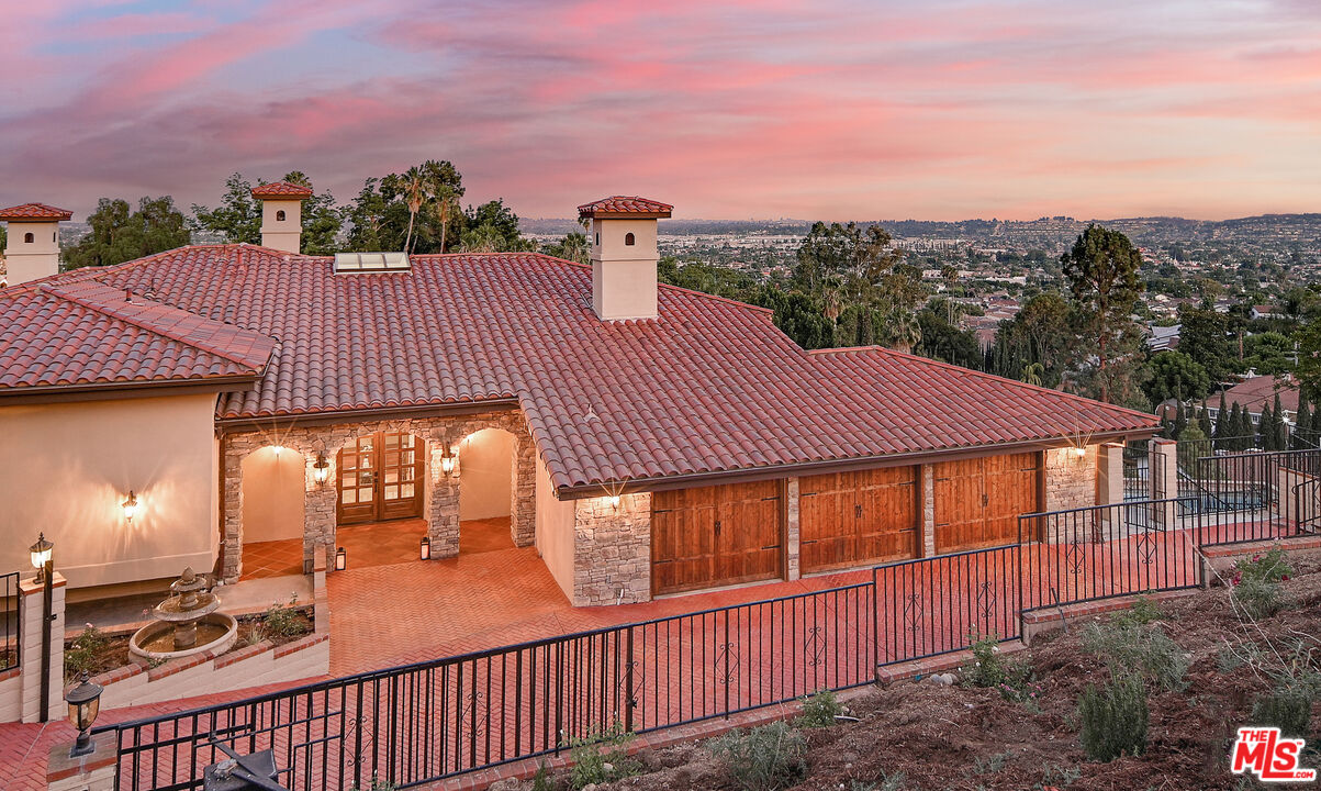 1405 Mayapan Road La Habra Heights, CA 90631 - Photo 5 of 54 a view of a house with a yard from a balcony