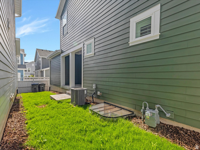 11759 South Watercourse Road South Jordan, UT 84009 - Photo 22 of 33 Green horizontal siding with white trim window