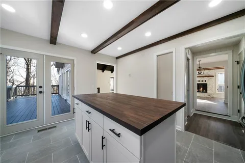 a view of a center island and living room