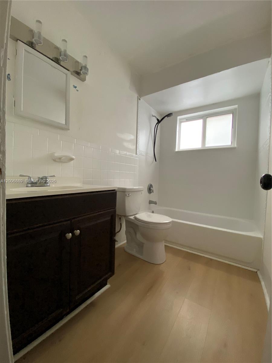 6132 Southwest 39th Street, Unit R Miramar, FL 33023 - Photo 12 of 21 a bathroom with a sink and a bathtub