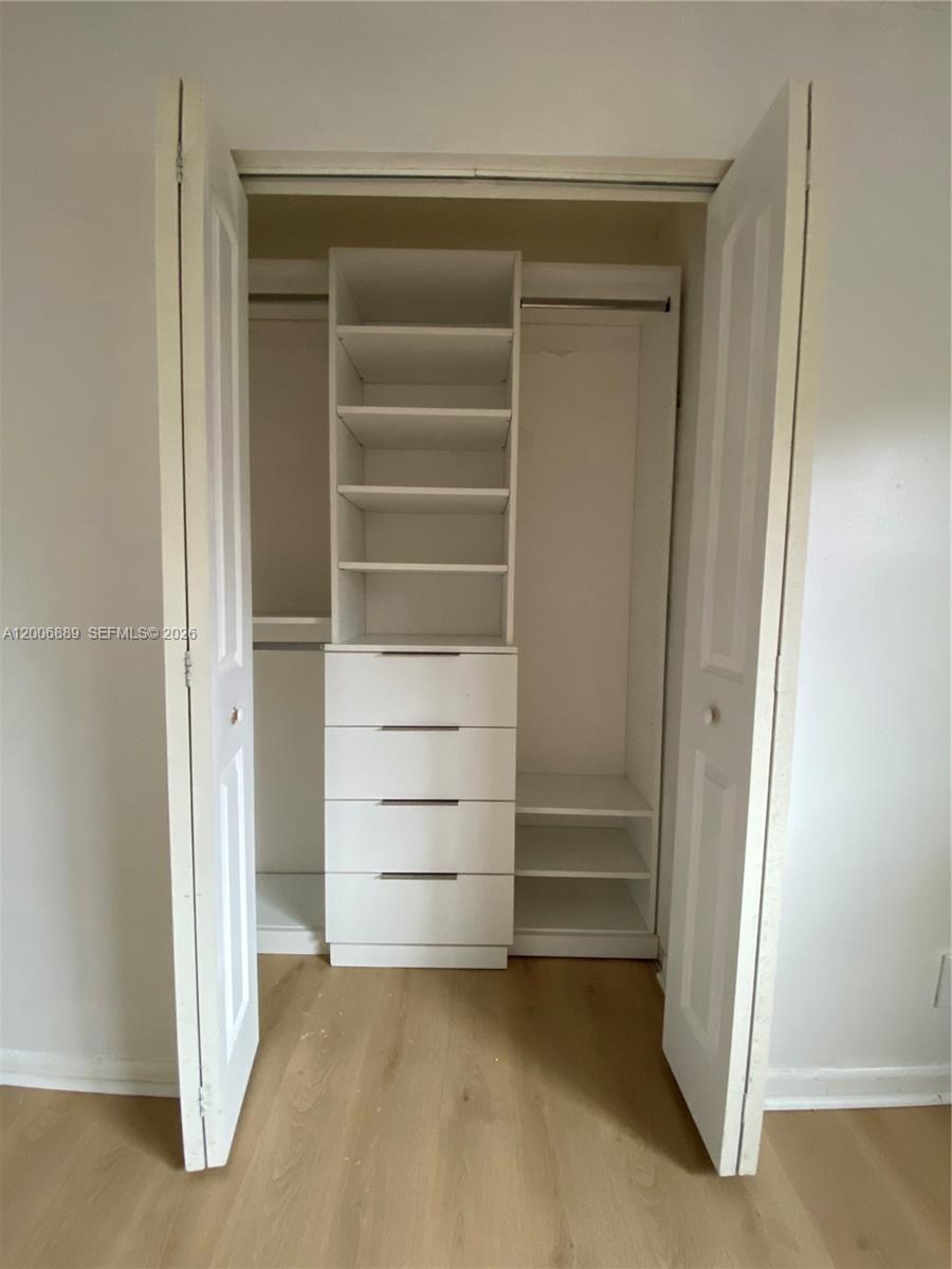 6132 Southwest 39th Street, Unit R Miramar, FL 33023 - Photo 18 of 21 a room with walk in closet