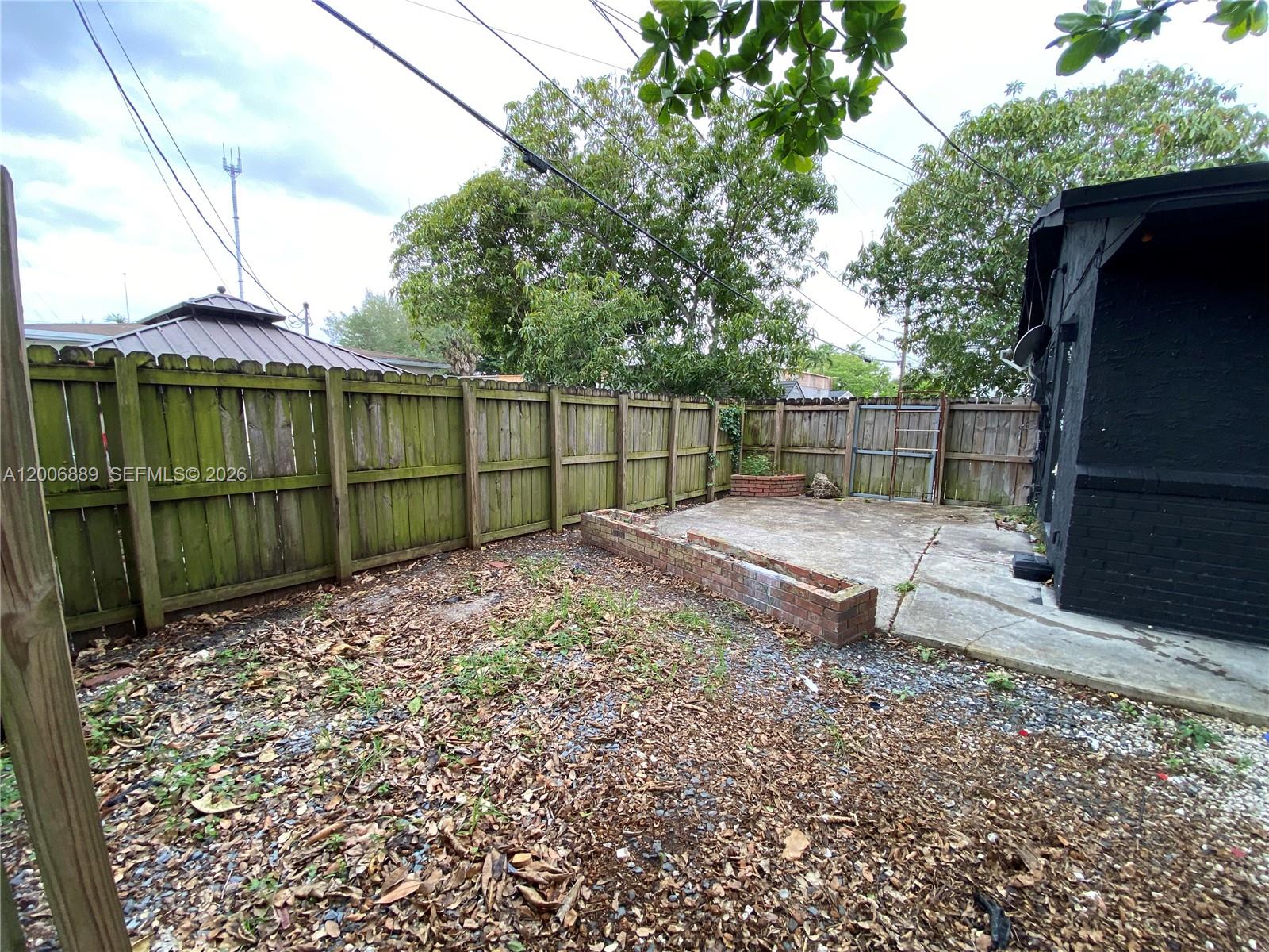 6132 Southwest 39th Street, Unit R Miramar, FL 33023 - Photo 21 of 21 a view of a backyard