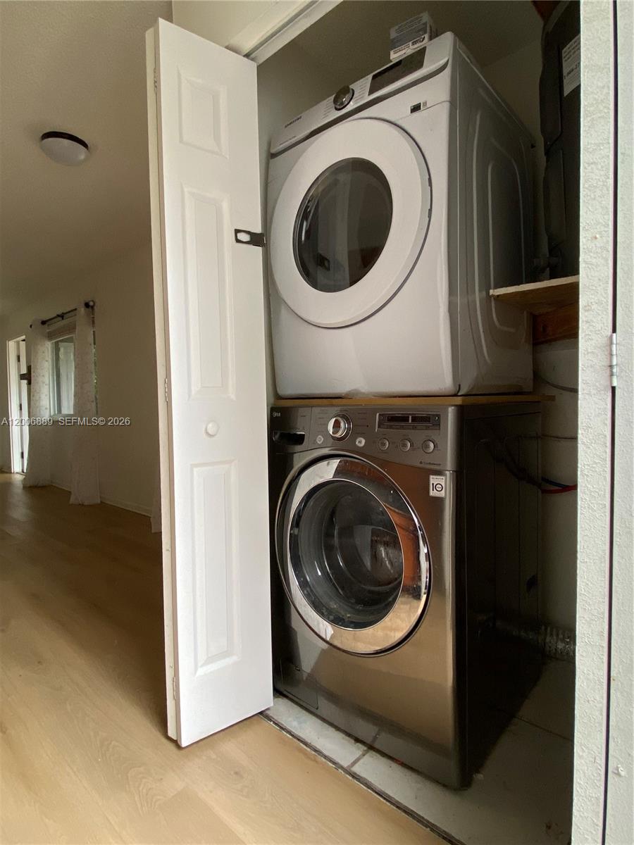 6132 Southwest 39th Street, Unit R Miramar, FL 33023 - Photo 8 of 21 a utility room with dryer and washer