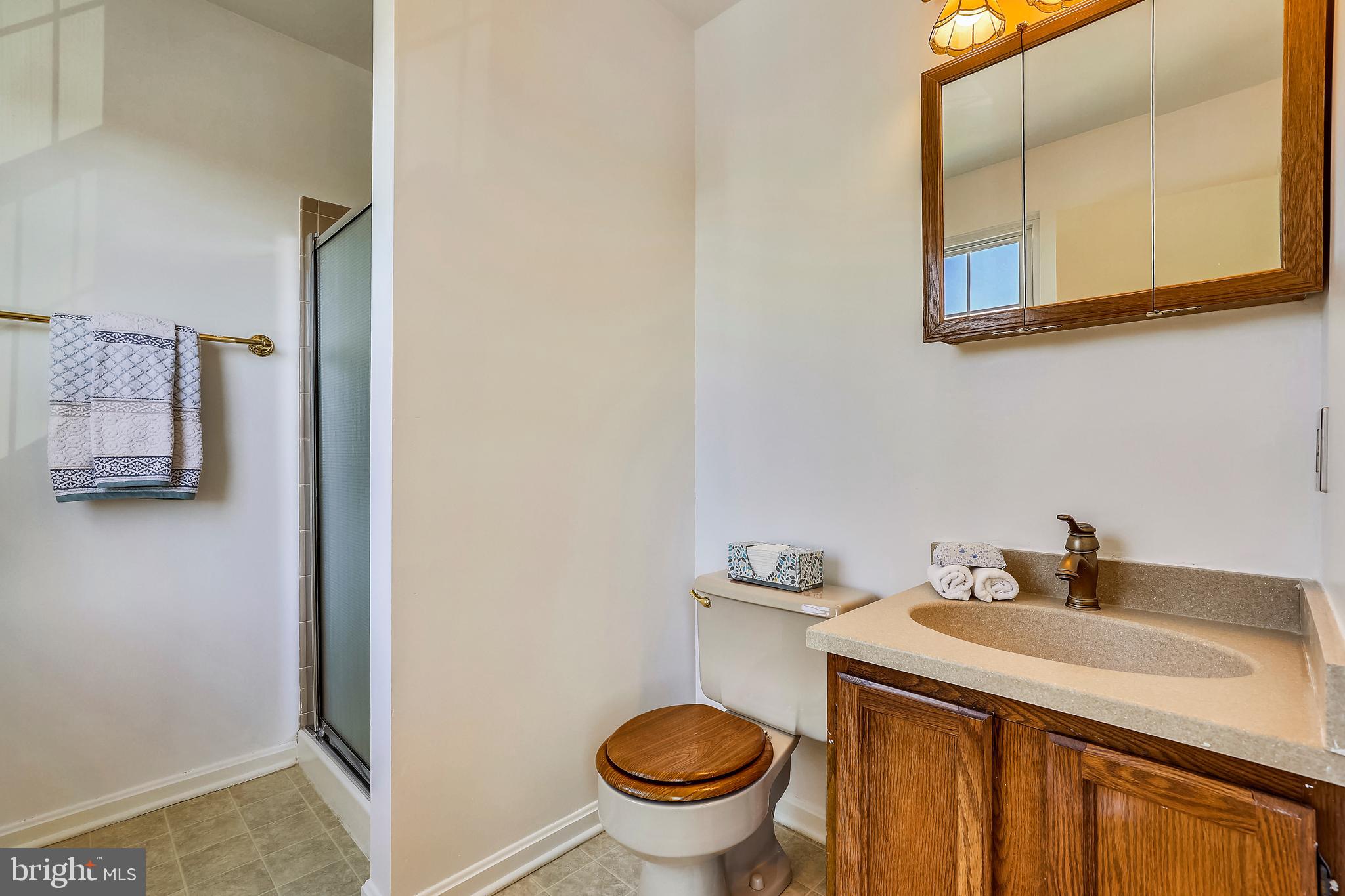 7805 Notley Road Pasadena, MD 21122 - Photo 14 of 30 En-suite Owner's Full Bath Upper Level
