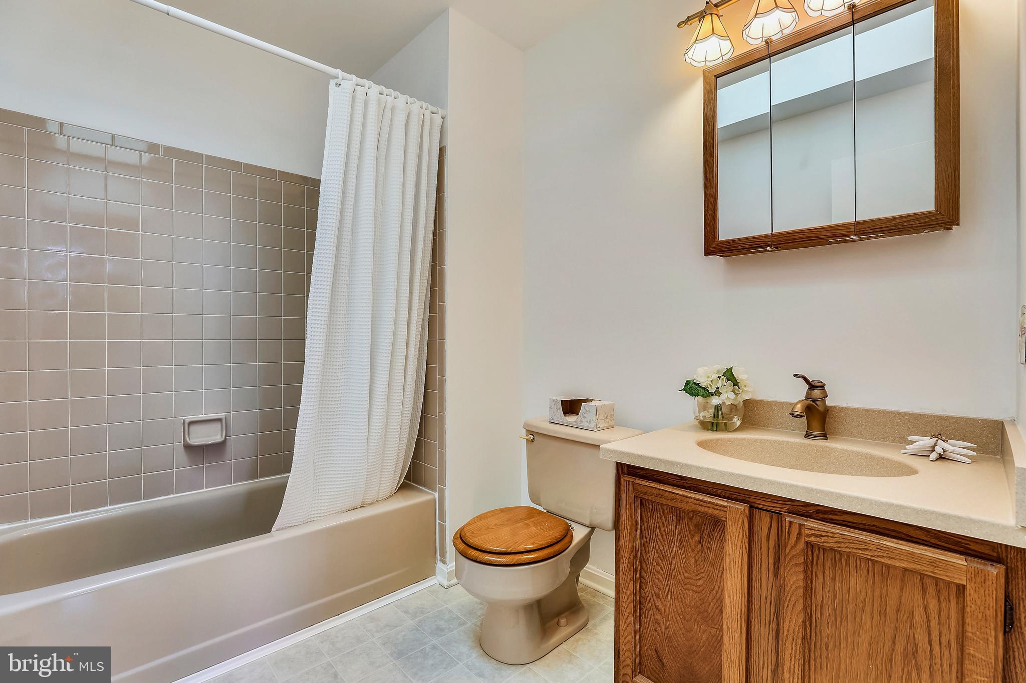 7805 Notley Road Pasadena, MD 21122 - Photo 18 of 30 Upper Level Hall Full Bath