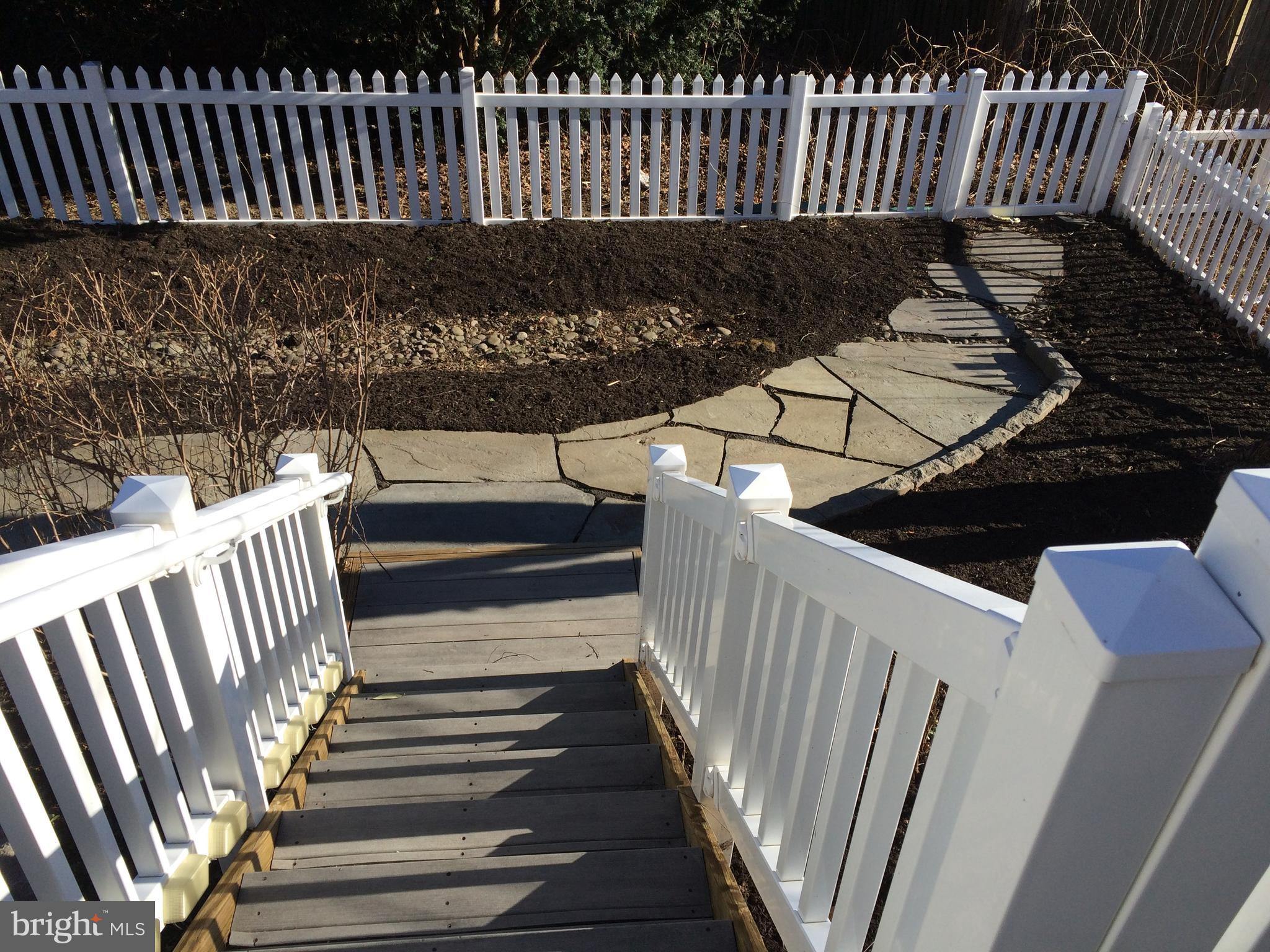 7805 Notley Road Pasadena, MD 21122 - Photo 24 of 30 Walkway at the bottom of the deck.