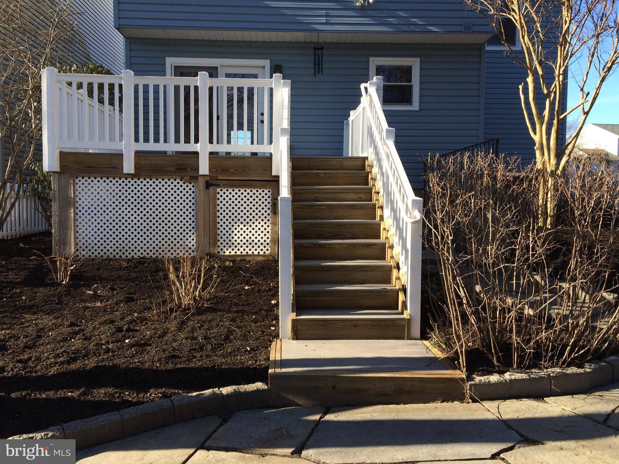 7805 Notley Road Pasadena, MD 21122 - Photo 25 of 30 Landscaping with beautiful plantings