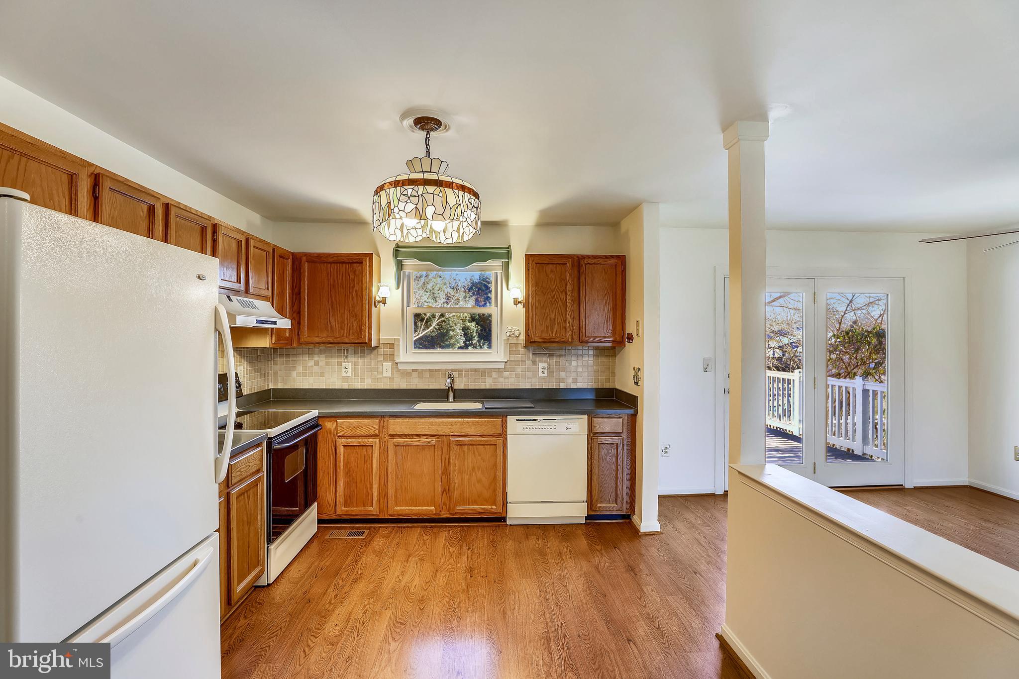 7805 Notley Road Pasadena, MD 21122 - Photo 4 of 30 Kitchen open to Dining Room