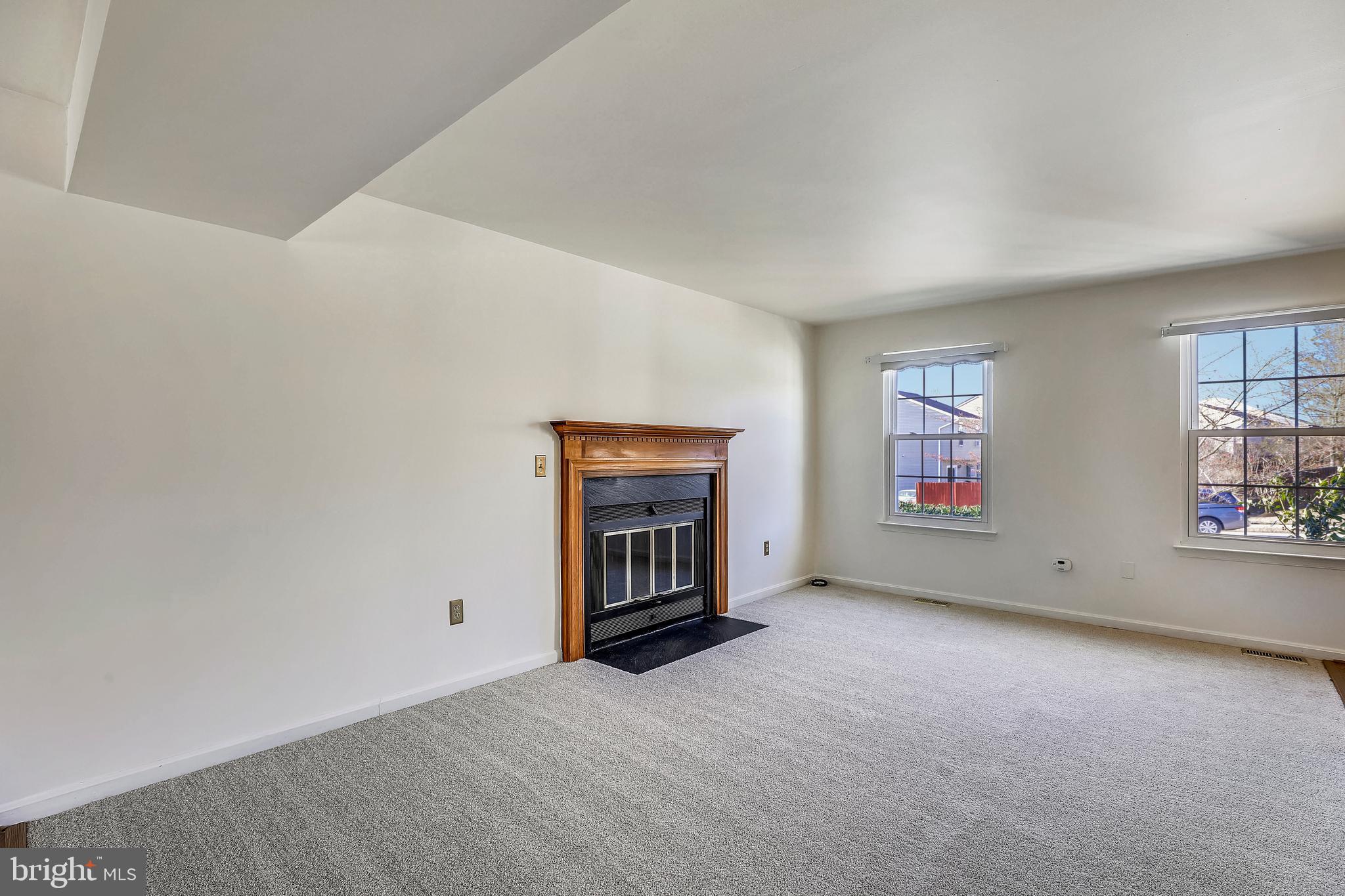 7805 Notley Road Pasadena, MD 21122 - Photo 6 of 30 Living Room with Fireplace