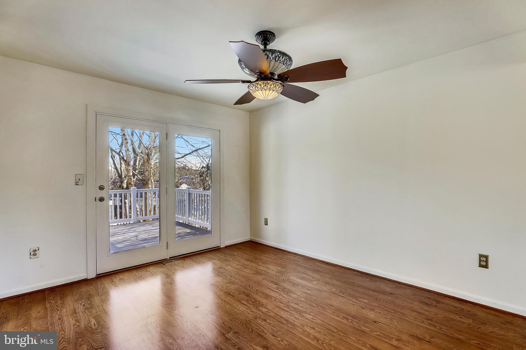 7805 Notley Road Pasadena, MD 21122 - Photo 7 of 30 Dining Room with Atrium doors to deck