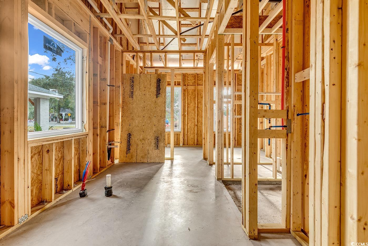 406 63rd Avenue North Myrtle Beach, SC 29572 - Photo 2 of 17 Misc room with plenty of natural light and concrete floors