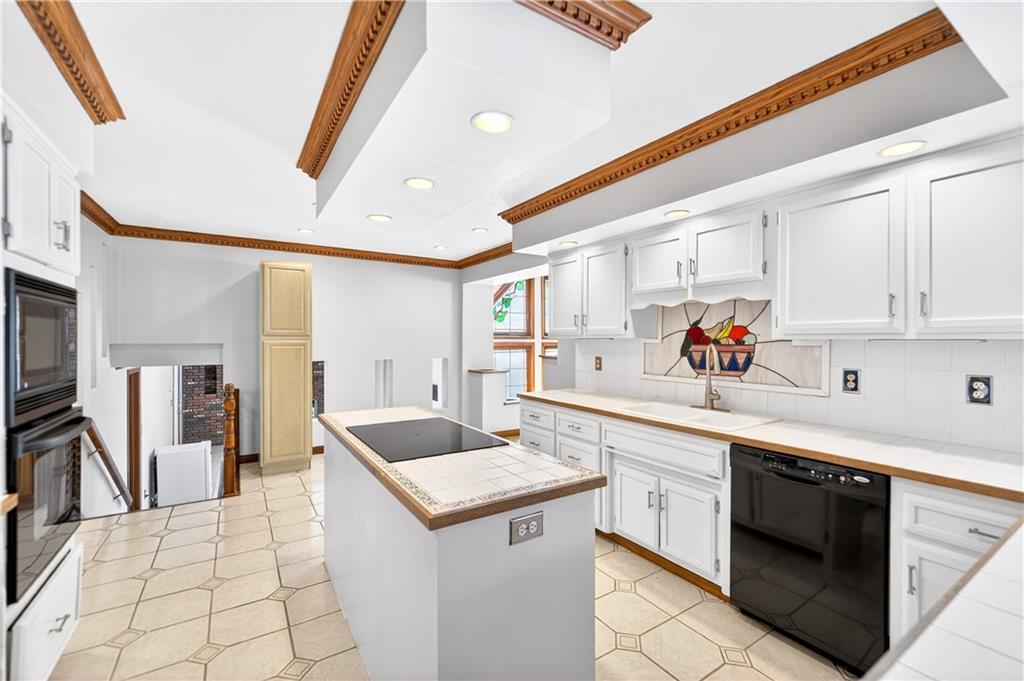 16 Ridgewood Drive McDonald, PA 15057 - Photo 11 of 47 a kitchen that has a sink and a stove in it