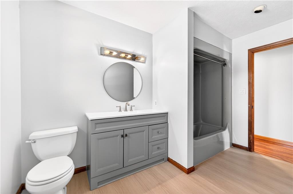 16 Ridgewood Drive McDonald, PA 15057 - Photo 34 of 47 a bathroom with a toilet a sink and mirror