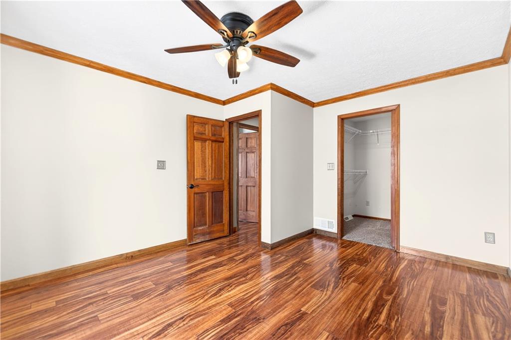 16 Ridgewood Drive McDonald, PA 15057 - Photo 36 of 47 a view of an empty room with wooden floor