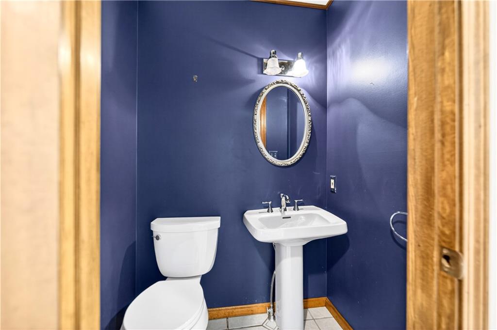 16 Ridgewood Drive McDonald, PA 15057 - Photo 38 of 47 a bathroom with a toilet sink and mirror