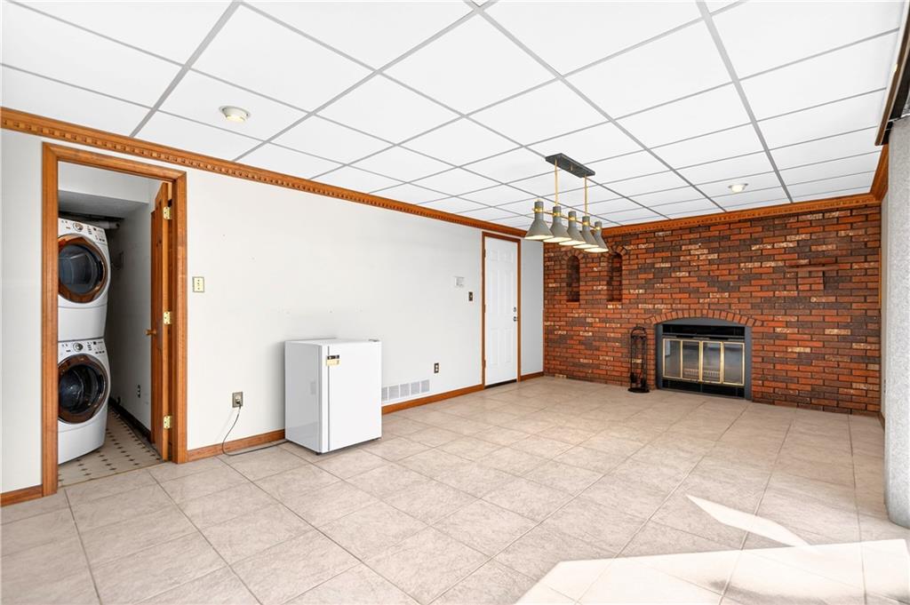 16 Ridgewood Drive McDonald, PA 15057 - Photo 40 of 47 a view of a livingroom with a washer and dryer