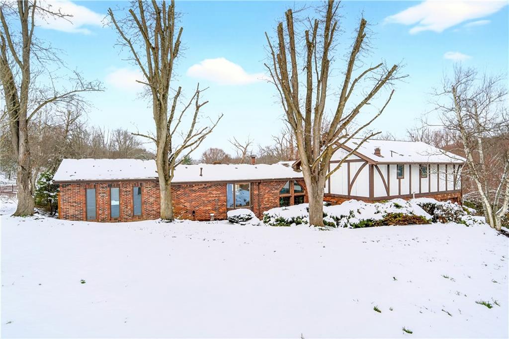 16 Ridgewood Drive McDonald, PA 15057 - Photo 46 of 47 a view of a house with a snow in front of yard
