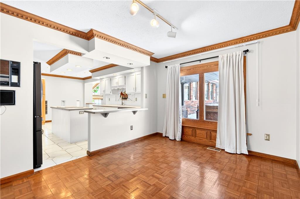 16 Ridgewood Drive McDonald, PA 15057 - Photo 9 of 47 a view of a kitchen with furniture and a window