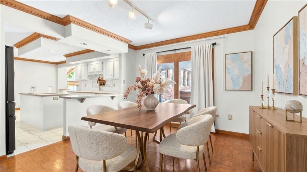 16 Ridgewood Drive McDonald, PA 15057 - Photo 10 of 47 a view of a dining room with furniture and wooden floor