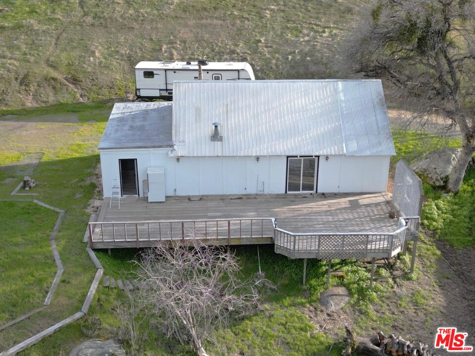 4132 Usona Road Mariposa, CA 95338 - Photo 2 of 26 an aerial view of a house with a garden