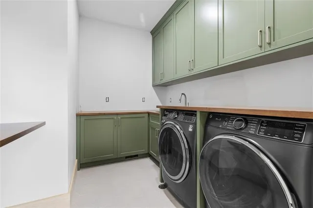 a view of a field with an trees in the background