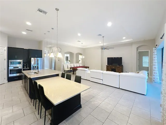 a kitchen with a stove and a sink