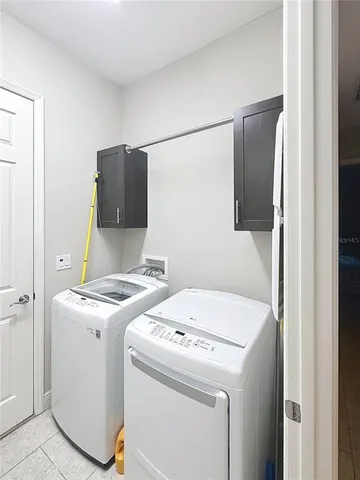 a view of a backyard with swimming pool