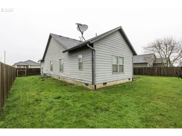 a view of a backyard with a garden